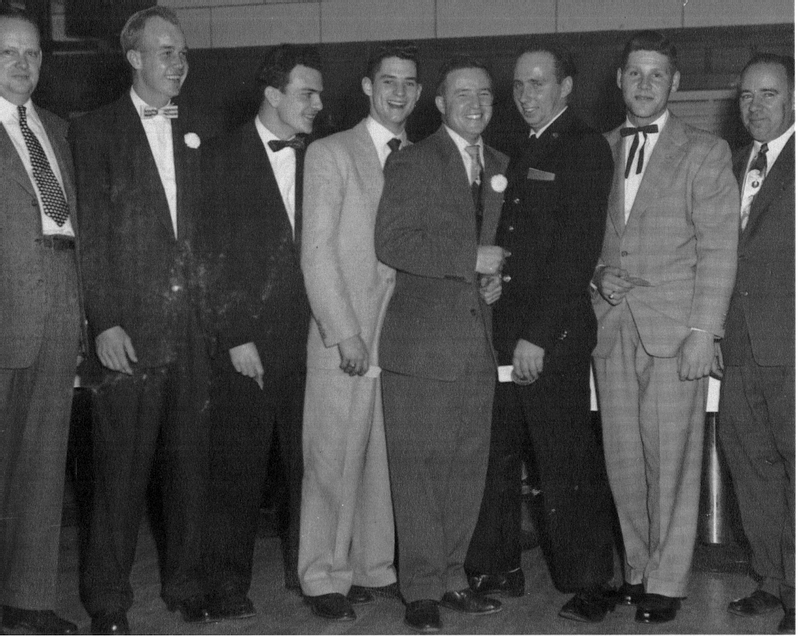 1954:  Firemen's Training Course Section II Advanced Graduation [l-r] Ben Poindexter, Bernie Beavan, Tom Bennett, Francis Cecil, Kirk Sterling, Moakley Mattingly Jr., Teddy Wathen & Ralph Messick