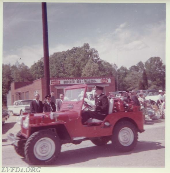 1963:Tommy Burris in Jeep-1 at Waldorf parade